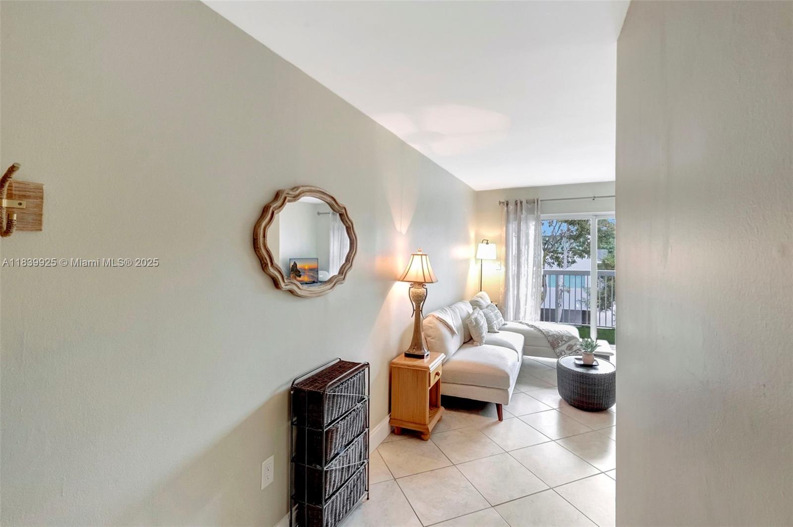 Cute, corner unit in a boutique Coconut Grove building. Lots of natural light in this two bedroom and one bath unit that offers tile floors through out, private balcony, recently updated bathroom, sunny kitchen with window, private washer and dryer in the unit and covered parking space. Custom built in closets. Building has recently gone through updates and owner has paid off all the special assessments in full. Low maintenance fee of $486 per month covers the exterior insurance, all the common area maintenance, water, sewer, trash, management and reserves. Unit is located on the South East corner of the building and set back from all neighbors and provides a quiet setting. Small pets are welcomed. Walking distance to multiple grocery stores, metrorail, dozens of restaurants, parks, cafes.