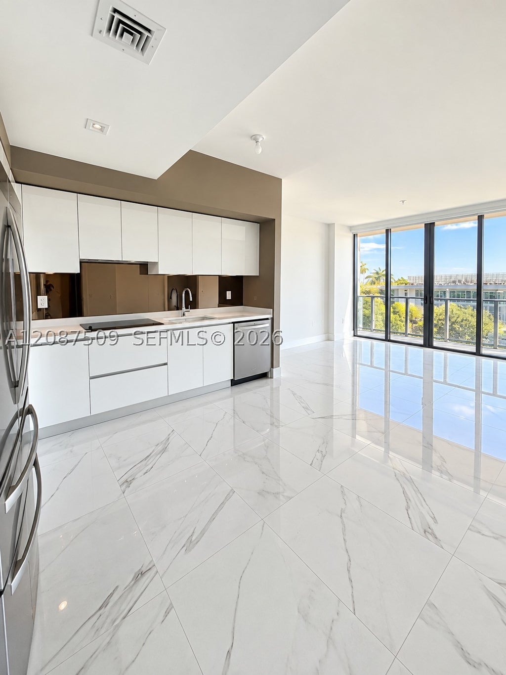 Photo of 1170 E Hallandale Beach Blvd #306, Hallandale Beach, FL 33009 (MLS # A12087509)