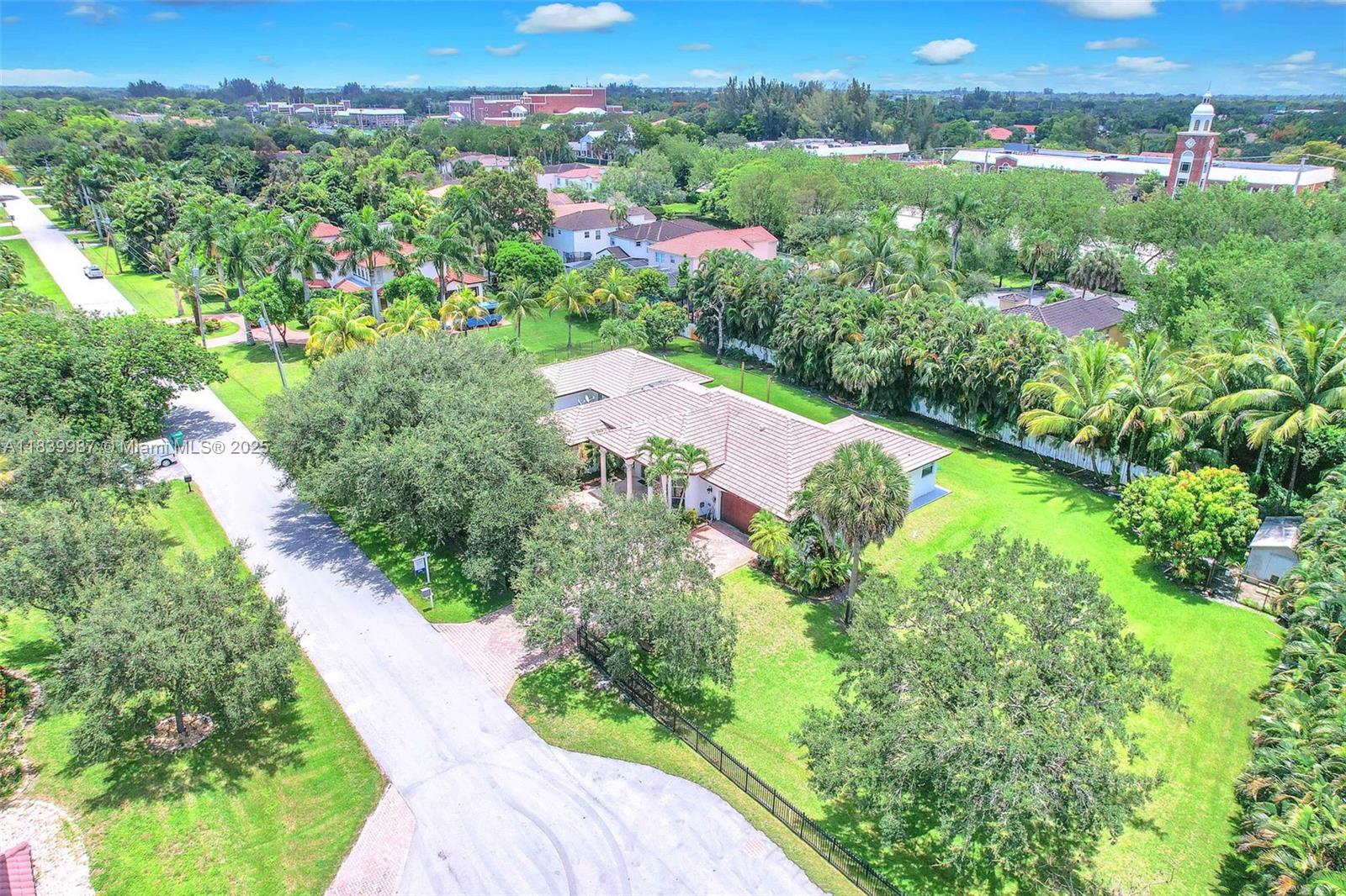BEST RENTAL IN PLANTATION ACRES! A corner lot property featuring 6 bedrooms, a den, 4 baths, 3 family rooms, an ac/c storage unit, and a 2-car garage. Nestled on nearly an acre, the fully fenced property features Avocado, Mango, and Lychee trees, creating a private oasis: an expansive Primary suite, and ALL generously sized rooms. The wide-open split floor plan enhances the sense of space, and natural lighting throughout the home, and the Kitchen with ample storage is ideal for entertaining. Gas Stove, a NEW refrigerator, plenty of storage, and 2 NEW AC units ensure year-round comfort. Walking distance to the renowned American Heritage School, Calvary Chapel in Plantation, and conveniently located minutes from Sawgrass Mills, shops, and restaurants. Schedule a tour today!