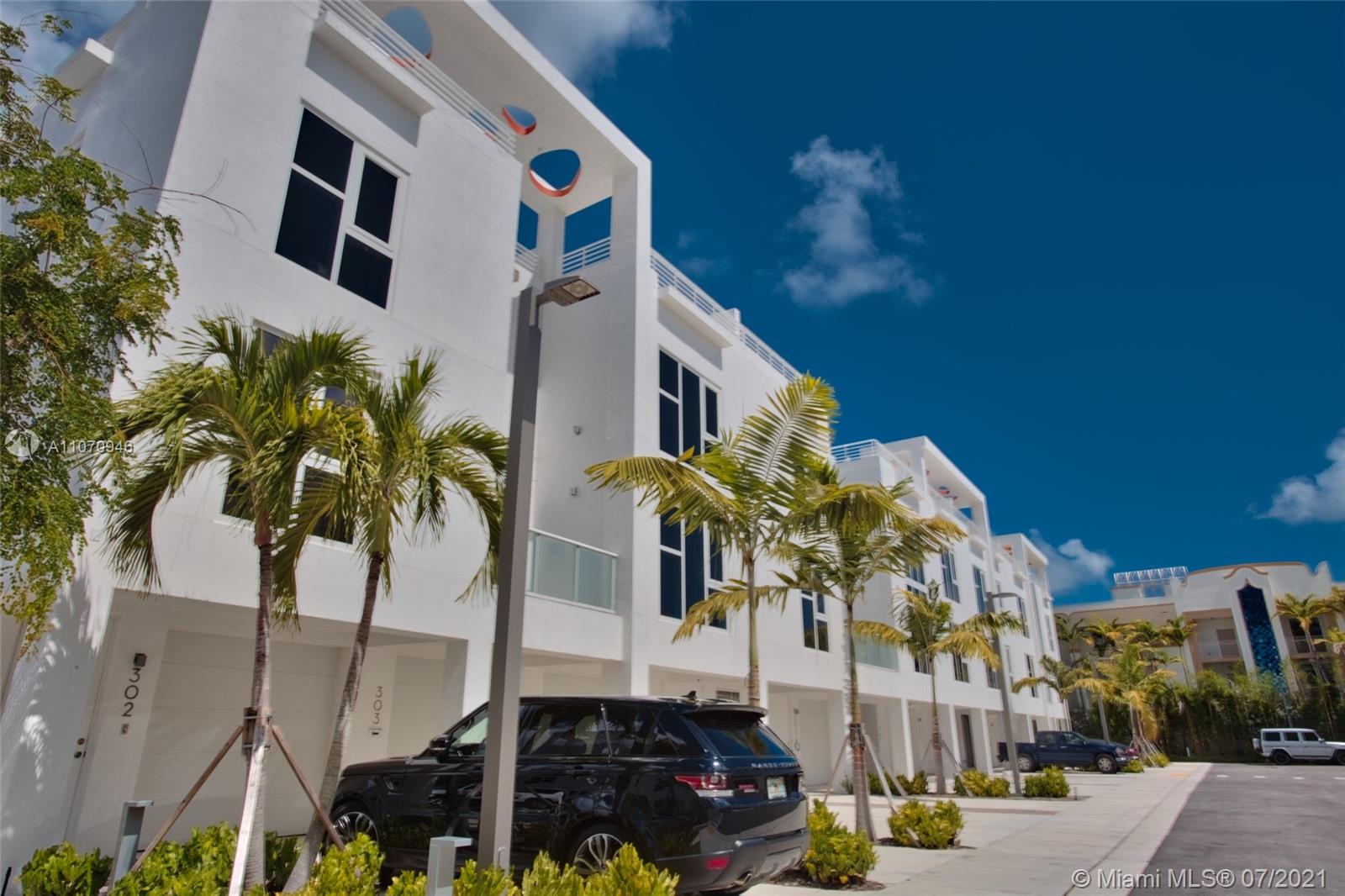 Ground level spacious 3 bedrooms plus den and 3 bath residence in a gated community in the heart of the Miami Design District, steps from Biscayne Bay, Design District shops and restaurants. The residence boasts an open floor plan on 1 level with covered garage, garden, and terrace. New Home has light wood flooring, designer finishes, sheer window treatments in the living areas & blackouts in the bedrooms.