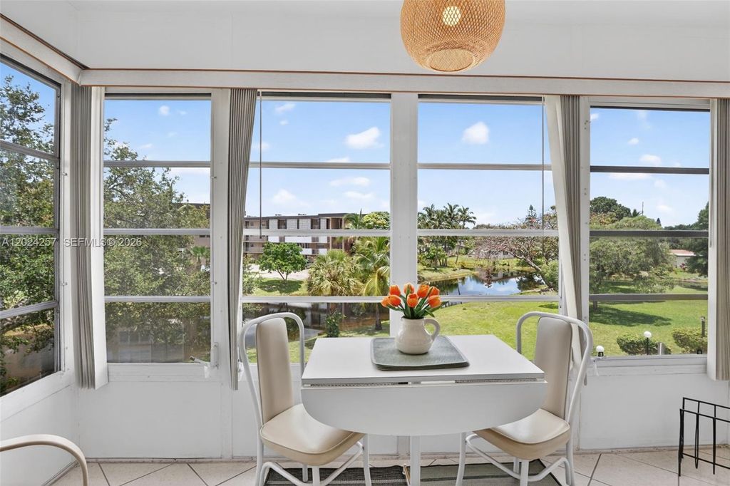 Photo of 2800 NW 47th Ter #303B, Lauderdale Lakes, FL 33313 (MLS # A12024257)