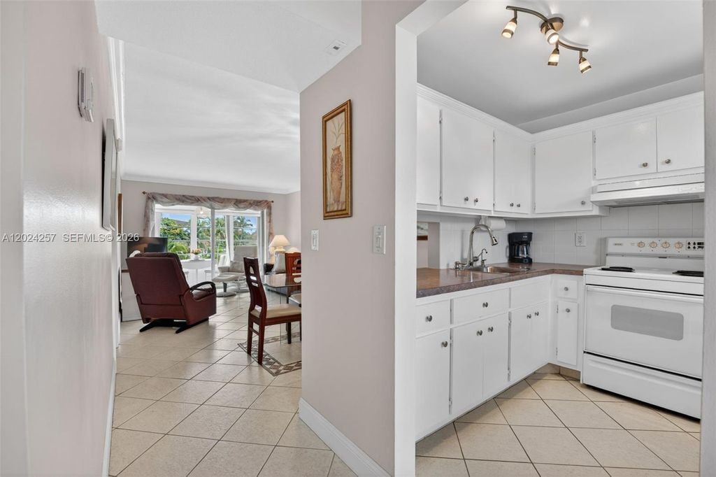 Photo of 2800 NW 47th Ter #303B, Lauderdale Lakes, FL 33313 (MLS # A12024257)