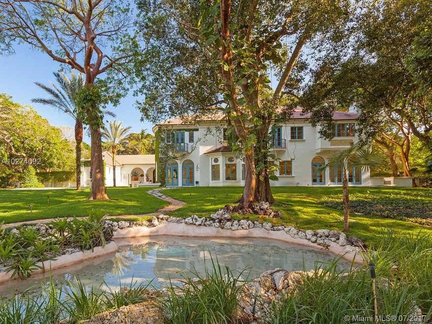 Fabulous French Country & modern Miami style converge in this park-like, 1+ acre Snapper Creek estate. Fresh updates, exquisite details & elegant, grand-scale interiors. Jerusalem stone & hardwood flow thruout. Soaring tower foyer & statement staircase amp up wow factor. Formal Living & Dining; 2 Family rms; Library. Classic Kitchen w/top-tier appliances; Breakfast Rm. Gorgeous Master; all bdrms en suite. Lush landscape; mature trees; lavish water features. Sublime luxury living in a subtropical paradise.