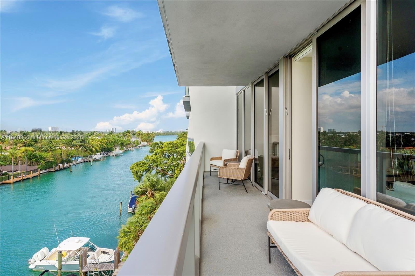 SUNNY & BREEZY, WEST WATER VIEW, CORNER UNIT 1,330 Sq. Ft. 2Bed/2Ba + Den w/ large balcony overlooking the CANAL/BAY tastefully and fully furnished with a clean + airy color palette. 2 car 2nd Fl Garage tandem parking & partial storage. Roof Amenities boasts infinity edge pool, 4 BBQ grills, sun loungers, tables/chairs, firepit & a soothing Spa - all looking out on one of the best sunsets and views on BHI! It is a well maintained, friendly building w/ kind neighbors and staff. Other amenities: 24 Hour Front Desk, BRAND NEW LARGE GYM, Boat Dock, Media Room. Walk to beach, shops/restaurants/cafes including Bal Harbor Shops, and Ruth K. Broad Bay Harbor K-8 School. BHI has its own has Police, Fire, Municipal Public works, Harbor police, Town Hall. FLL/MIA Airports conveniently equidistant.