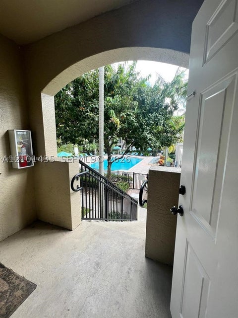 Photo of 5940 W Sample Rd #304, Coral Springs, FL 33067 (MLS # A12101435)