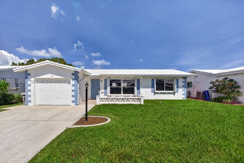 Photo of 341 NW 25th Ct, Pompano Beach, FL 33064 (MLS # A12101957)