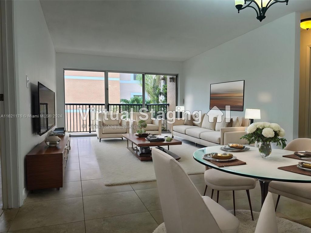 Photo of 8851 Wiles Rd #208, Coral Springs, FL 33067 (MLS # A11621176)