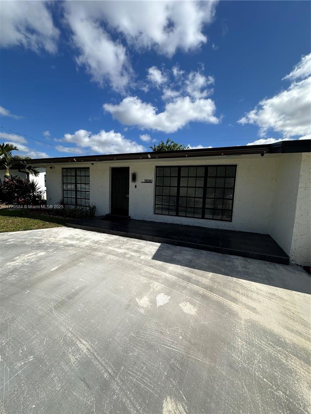 Photo of 12010 NW 33rd St, Sunrise, FL 33323 (MLS # A11770584)