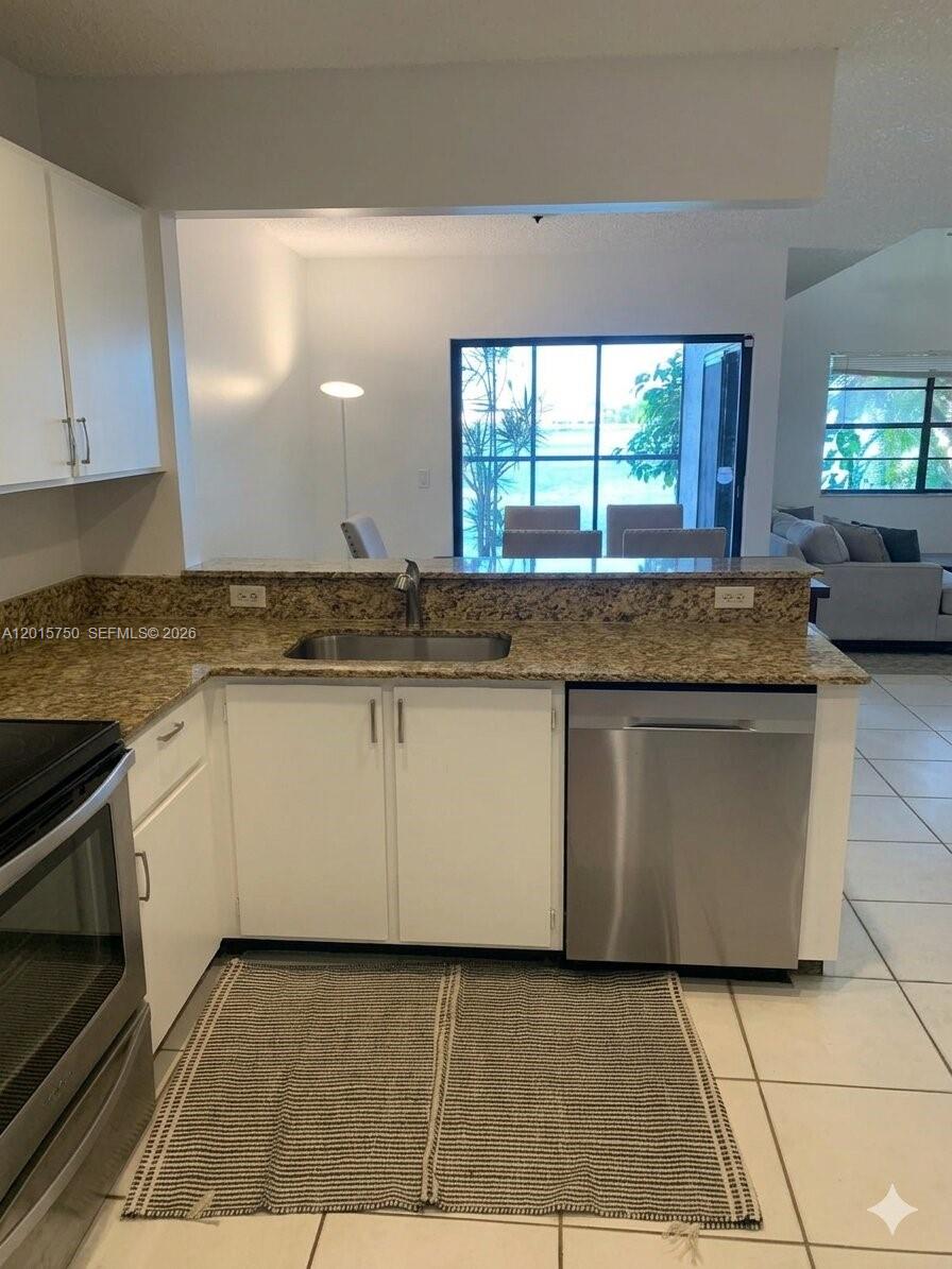 CONDO F AT MEDITERRANEA - Residential