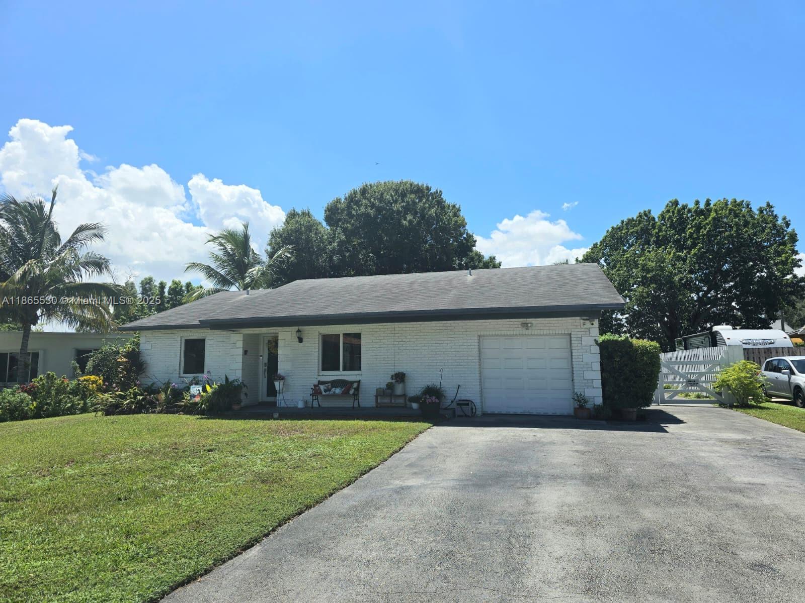 Gorgeous rarely available 5-bedroom, 2-bath home on a fully fenced 1/3-acre lot, tucked away on a private dead-end street. This move-in ready home features spacious bedrooms, ample closets, high-impact windows and doors, a renovated kitchen with granite counters and stainless-steel appliances, pantry, and tile and laminate flooring throughout. Furniture negotiable. The oversized driveway offers space for multiple cars, an RV, or a boat. A large yard with mature fruit trees creates the perfect backdrop for entertaining, relaxing, or expanding. Just minutes to shopping, dining, Lakewood Mall, and major highways, this home offers a rare combination of space, convenience, and versatility — ideal as a residence, Airbnb, or investment property.