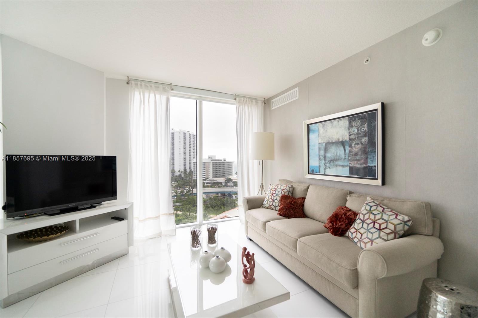 Luxury Furnished 3BR/2BA in Sunny Isles Beach! 1,435 sq ft with ocean & city views. Modern kitchen, custom cabinetry, premium appliances, and spacious master suite with a walking closet and spa-style bath. Enjoy resort amenities: heated pool, spa, gym, beach service, concierge & 24/7 security.
Perfectly positioned near upscale shopping, gourmet dining, and vibrant nightlife - this is your chance to own a slice of paradise.