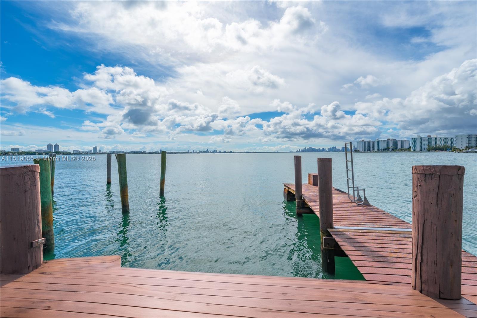 Presenting a rare chance to acquire a wide bay single-family home with breathtaking wide bay views. 8,850 SQ FT ft lot featuring 52 feet of water frontage on the wide bay, with downtown views. There are no fixed bridges to the ocean. ** Grandfathered Boat Dock Pilings** significantly enhance the value of this already attractive property. Offering RM-1 Zoning, perfect for a new condominium development project. The FAR of 1.25 permits up to 11,000+/- sq feet of living space, with a maximum height of 55 feet. The property is not historic, paving a path to creating something extraordinary. This is a prime residential development opportunity not to be missed.