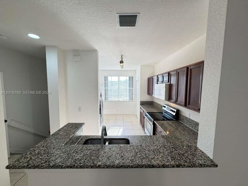 Photo of 1984 NE 5th St #203, Boynton Beach, FL 33435 (MLS # A12016789)