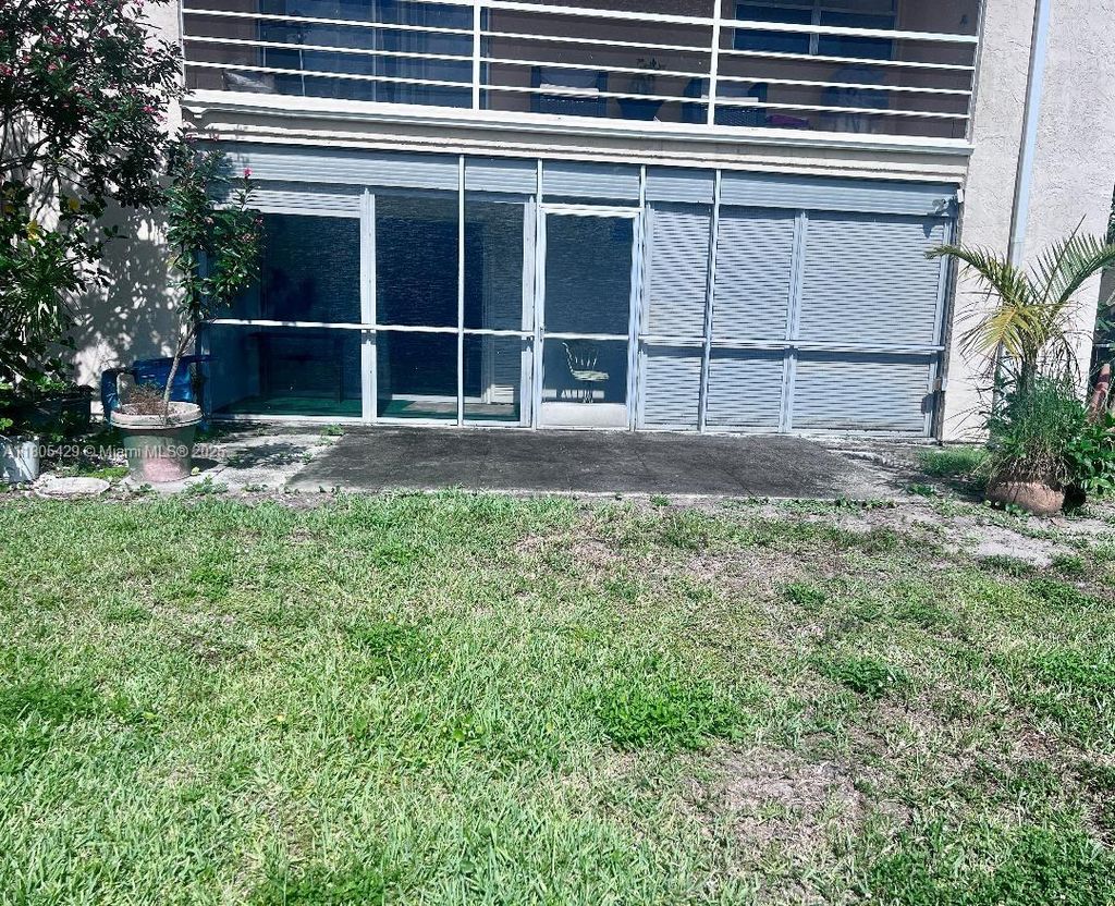 Photo of 10693 N Military Trl #5, Palm Beach Gardens, FL 33410 (MLS # A11805429)