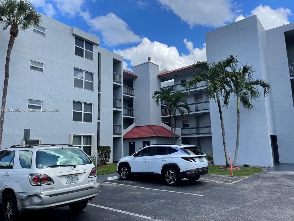 Photo of 9460 Live Oak Pl #106, Davie, FL 33324 (MLS # A11906565)