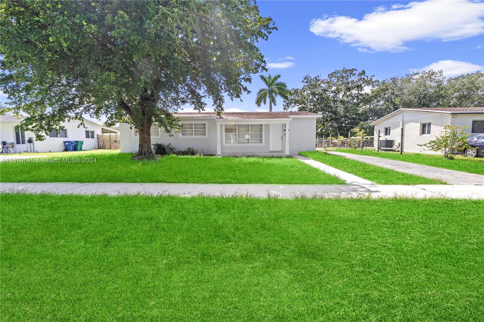 Welcome to your dream home! This beautifully remodeled 3-bedroom, 2-bathroom residence boasts an inviting open floor plan that seamlessly connects living, dining, and kitchen areas, perfect for modern living and entertaining. Freshly painted inside and out, this home exudes a bright, welcoming ambiance.Convenience is key with a dedicated laundry room, making chores a breeze. The expansive yard offers a wonderful outdoor escape, complete with a covered patio—ideal for summer barbecues and family celebrations. Located in a desirable neighborhood, this home is priced at $25,000 below appraised value, providing incredible value for the future buyer! Don’t miss your chance to make this stunning property your own!