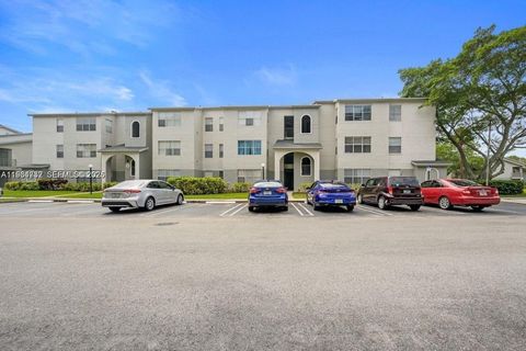 Photo of 1401 Village Blvd #127, West Palm Beach, FL 33409 (MLS # A11934732)