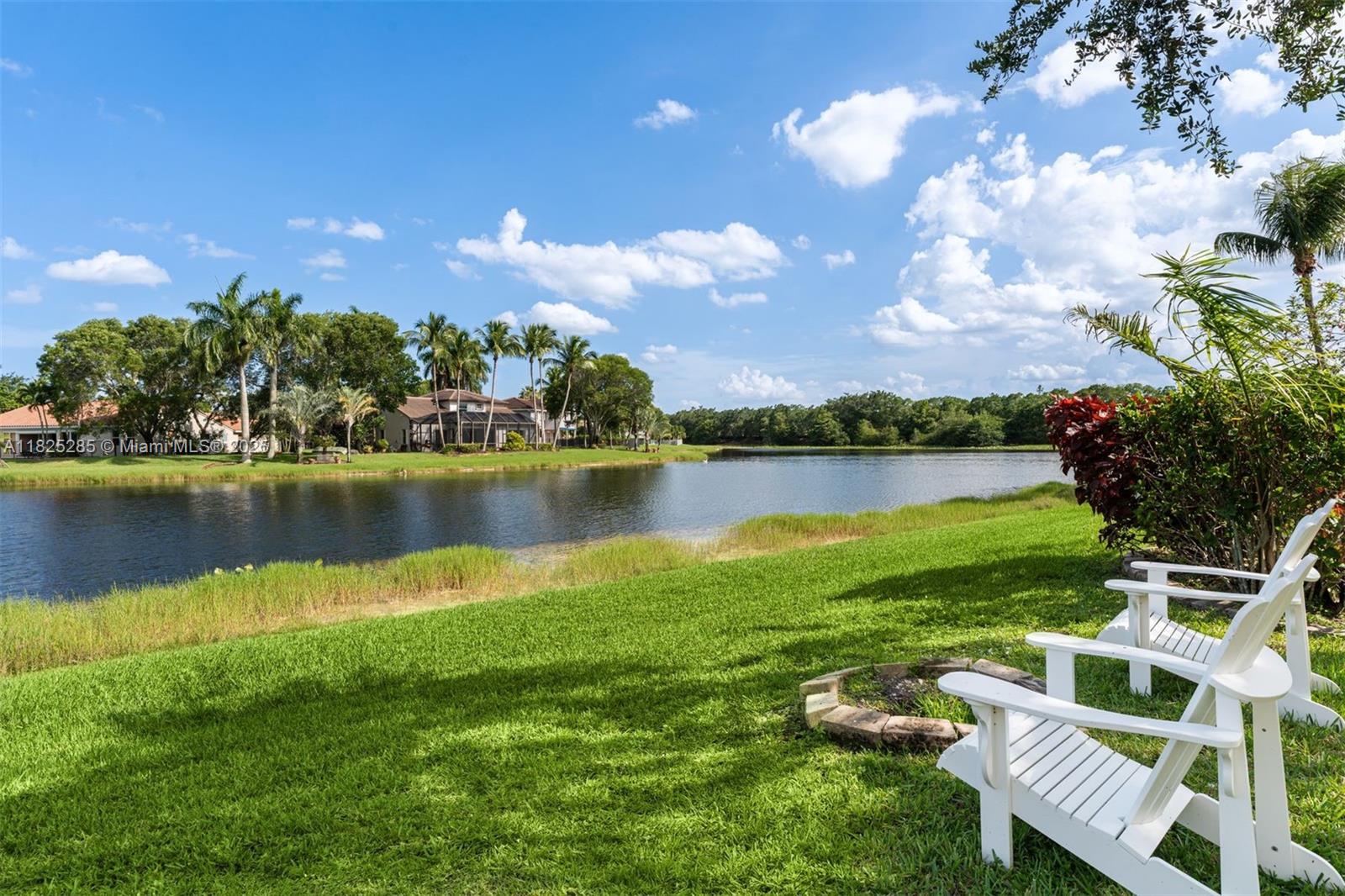 Lakefront two-story 4BD/2.5BA home in prime Weston location with over 2,600 SF of living space. Enjoy tranquil water views and an open layout with abundant natural light. This home features spacious bedrooms for children and/or guests, plenty of space to entertain, new WiFi/smart stainless steel Samsung appliances and a 240V EV charger in the 2-car garage. The expansive backyard offers stunning sunsets over the lake which is perfect for relaxing evenings or weekend BBQs in the covered patio. Live in one of South Florida’s most desirable cities (gated community as well), known for its quiet family friendly neighborhoods, safety, parks, and top-rated schools.