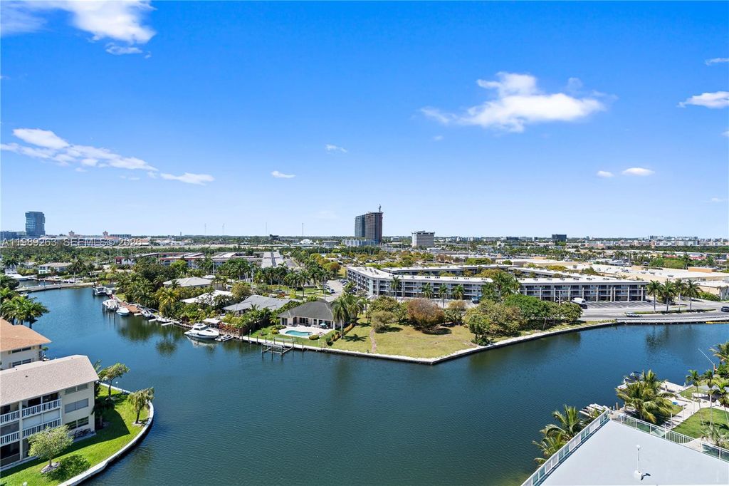 Photo of 437 Golden Isles Dr #11J, Hallandale Beach, FL 33009 (MLS # A11989263)