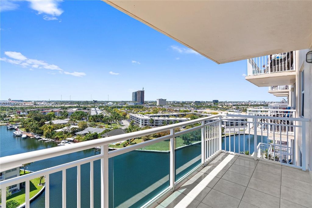 Photo of 437 Golden Isles Dr #11J, Hallandale Beach, FL 33009 (MLS # A11989263)