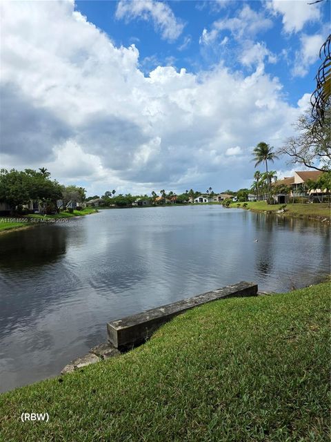 Photo of 7532 NW 86th Ter #104, Tamarac, FL 33321 (MLS # A11984650)