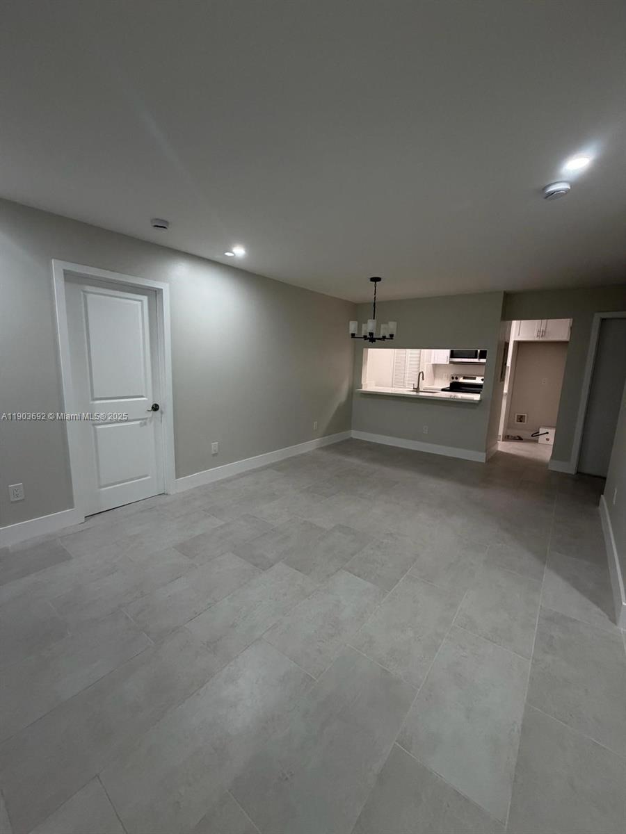 Discover comfort in this beautiful, fully remodeled second-floor condominium! With an open-concept design, this stunning home features an elegant kitchen with quartz countertops, stainless steel appliances, and custom cabinetry. The spacious living room is filled with natural light and connects with the elegant dining room and balcony. The primary suite offers a walk-in closet and a renovated en-suite bathroom. The second bedroom also features a walk-in closet. The third bedroom is perfect for a home-office. The second bathroom also beautifully updated. Enjoy excellent amenities, including, pool, gym, clubhouse, & tennis courts. Located close to shops, restaurants, and entertainment. Move-in ready and offering the perfect combination of luxury and convenience. Don’t miss this opportunity!