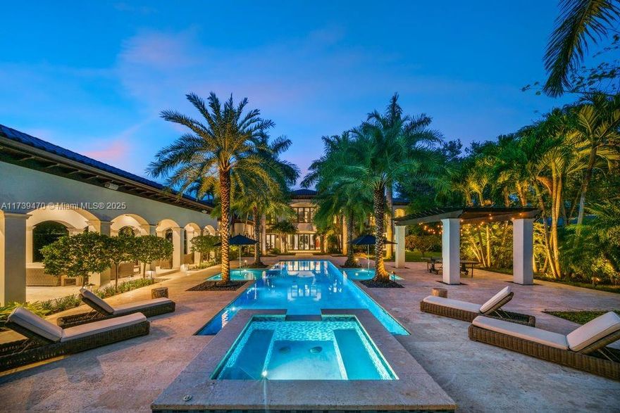 Nestled on a corner lot in the prestigious North Pinecrest neighborhood, this extraordinary residence with 6 bedrooms and 8.5 baths boasts 12,294 SF of thoughtfully designed living spaces, seamlessly blending elegance, comfort, and modern luxury. The kitchen is a culinary haven, equipped with a butler's pantry, top-of-the-line appliances, and a marble island. The main suite is a true sanctuary with custom-built walk-in closets, a luxurious bathroom and a private terrace offering stunning views. Every feature elevates your lifestyle, including an elevator, wine cellar, gym, game room, smart home technology, media room, 3-car garage, and a whole-house generator. Close to excellent schools, this home offers the perfect balance of elegance, functionality, and modern luxury.