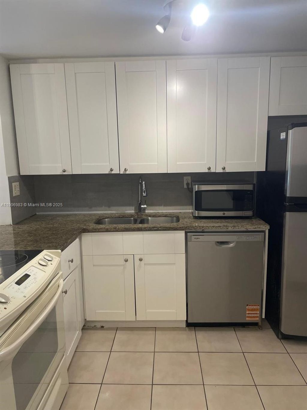 Photo of 4384 NW 9th Ave #20-1F, Deerfield Beach, FL 33064 (MLS # A11906983)