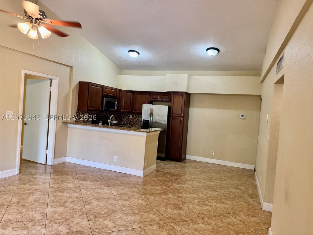 Photo of 621 Lyons Rd #9205, Coconut Creek, FL 33063 (MLS # A12073343)