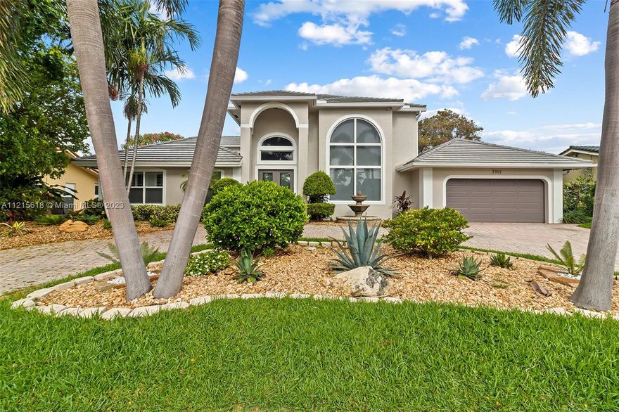 Grand waterfront estate in Venetian Isles. Located on 90' of deep water access and no fixed bridges. Offering 4 bedrooms 3.5 baths. New roof completed in 2022 and all windows/doors are hurricane impact. Additional features include a separate laundry room, massive den with fireplace that opens to pool/canal, formal living and dining rooms, cabana bath, oversized 2 car garage, lots of natural light, and privacy landscaping. View today!