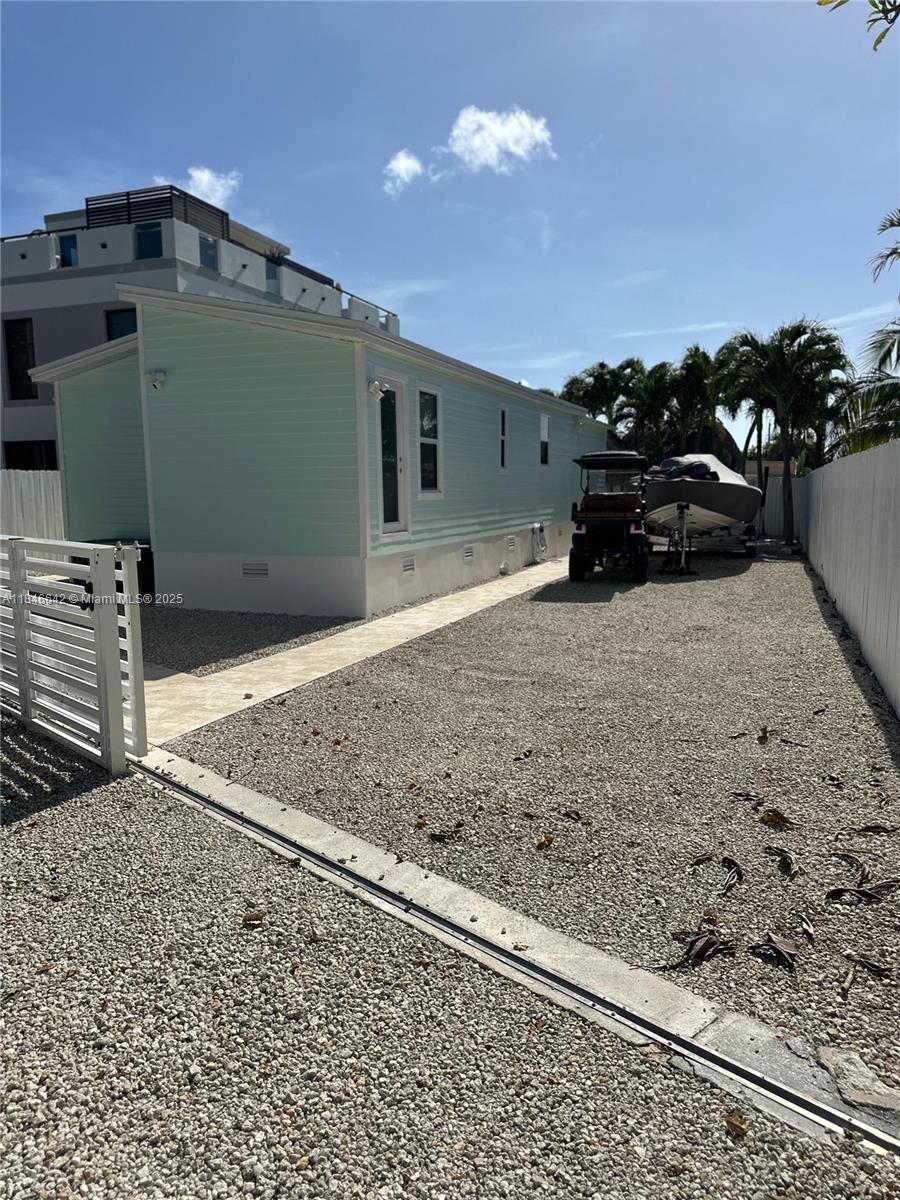 Charming manufactured home located in the heart of Key Largo. Built in 2008 and effectively updated in 2015, this single-story residence features 2 spacious bedrooms and 2 full bathrooms, making it ideal as a primary home, vacation retreat, or investment property.
The home sits in a peaceful neighborhood, just minutes from the water, local marinas, and the best of island living.
Don't miss your opportunity to own a slice of paradise in the Florida Keys at a competitive price! Schedule your private showing today!!!