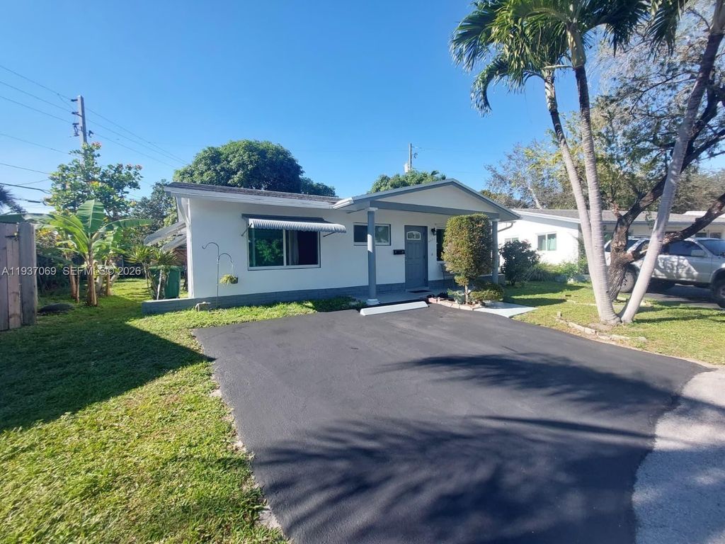 Photo of 4571 NW 19th Way, Tamarac, FL 33309 (MLS # A11937069)