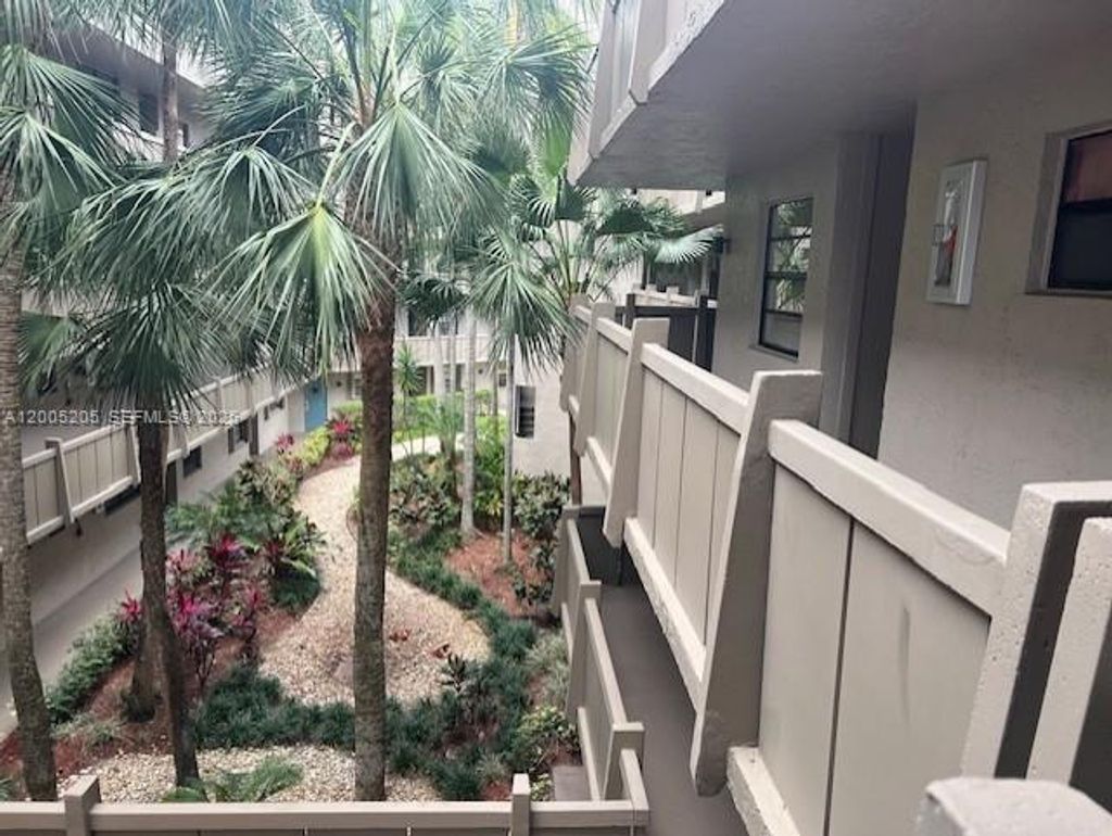 Photo of 1101 Colony Point Cir #318, Pembroke Pines, FL 33026 (MLS # A12005205)