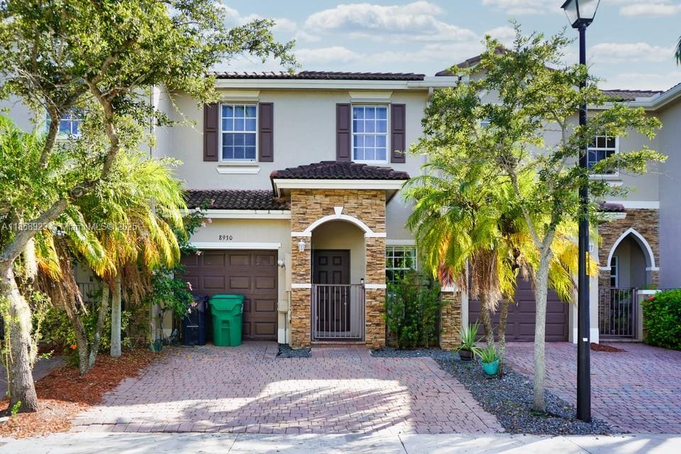 Beautiful 3-bed, 2.5-bath townhome in The Cove at Isles of Bayshore! Enjoy a spacious layout with an upgraded kitchen, modern bathrooms, and updated flooring throughout. All bedrooms are upstairs for added privacy. Private fenced patio is perfect for relaxing or entertaining. The garage was partially converted into an extra room while maintaining usable garage space. Located in a gated community with resort-style amenities including a clubhouse, pool, and fitness center. Prime Cutler Bay location—minutes to Turnpike, Black Point Marina, parks, and shopping!