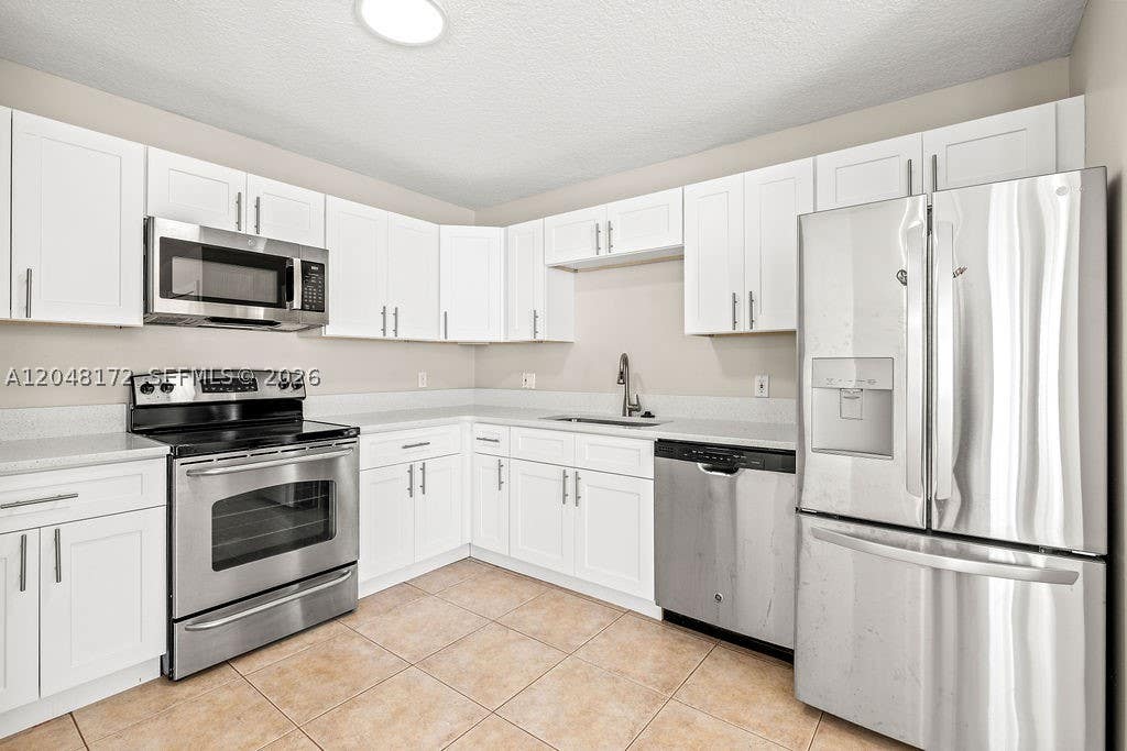 Photo of 1542 N Lawnwood Cir #37D, Fort Pierce, FL 34950 (MLS # A12048172)