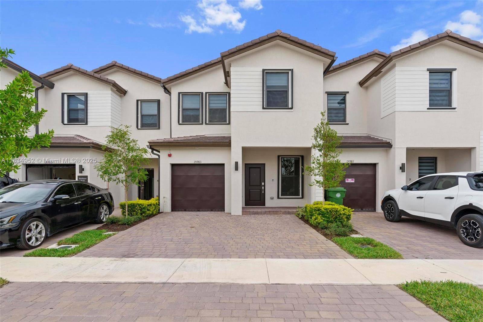 Stunning townhouse in Sunset Pines, family friendly gated community located in wester of Pembroke Pines. Conveniently located minutes away from I-75. Situated near excelent schools. Many shopping malls, supermarkets, restaurants and entertainments within walking distance. This beautiful home has a modern kitchen with quartz countertops, ss appliances, a great family room open to a patio with fence, one car garage plus 2 car driveway, spectaculars blinds and Accordion Shutters in all windows. Pet friendly community.