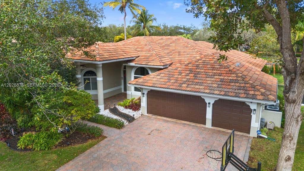 Photo of 12123 NW 10th Mnr, Coral Springs, FL 33071 (MLS # A12025576)