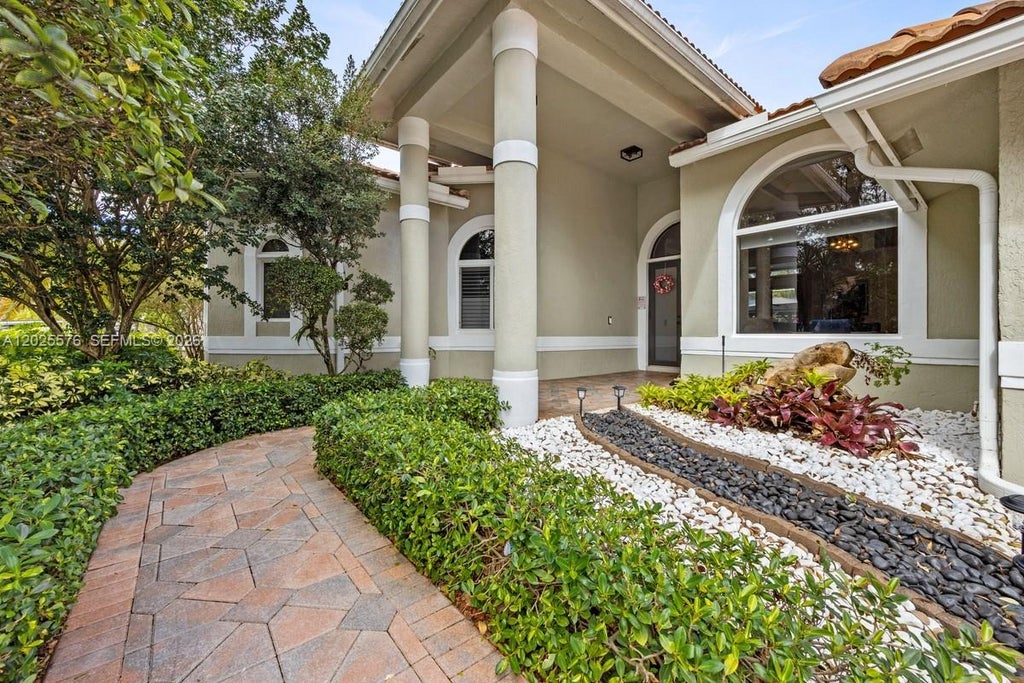 Photo of 12123 NW 10th Mnr, Coral Springs, FL 33071 (MLS # A12025576)