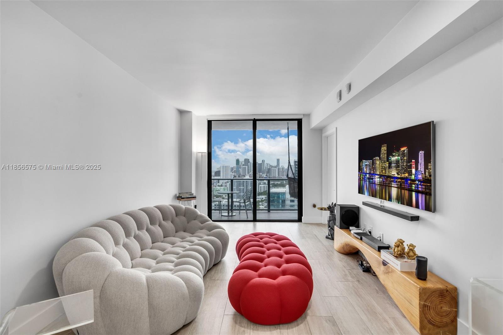 Live Above It All at Hyde Midtown. Perched on the 30th floor, this 1 bed / 1 bath + den combines panoramic Miami views with the convenience of full smart-home automation — control lighting, climate, and blackout shades with a touch. The open kitchen, premium flooring, and custom window treatments create a modern space that’s as functional as it is stylish. Fully furnished and tastefully decorated, it’s move-in ready. Step onto your private balcony for sweeping views of the skyline and Edgewater waterfront. Enjoy resort-style amenities including a heated pool with cabanas, spa, fitness center, tennis court, and on-site dining. All just moments from Midtown’s shops, Wynwood’s galleries, and the Design District’s boutiques.