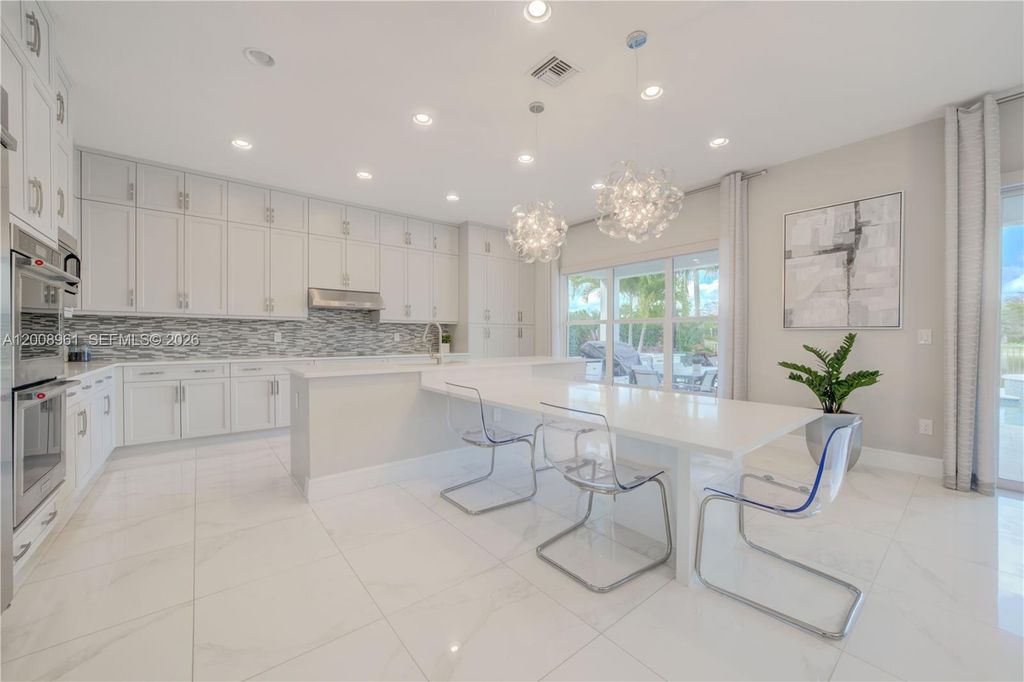 Photo of 11655 Windy Forest Way, Boca Raton, FL 33498 (MLS # A12008961)