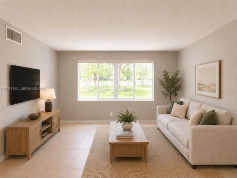Photo of 14840 Naranja Lakes Blvd #C1L, Homestead, FL 33032 (MLS # A12017465)