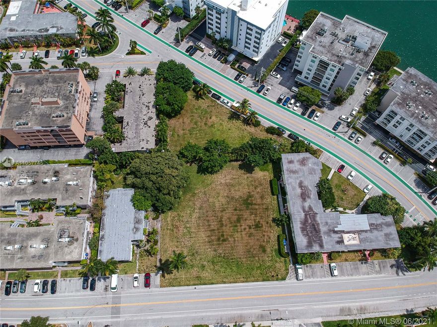 Fantastic opportunity for investors and developers: 2 lots for sale together in Bay Harbor, in front of one of the best schools in the County. The sale includes 2 different folios 1322270013151 (10,425 Sf) & 1322270013160 (11,250 Sf), TOTAL 21,674 Sf, and the approved plans for a project called CASA VERDE (only need to resubmit the plans to the Town). The project is an 8 level with a rooftop sky terrace level condominium that comprises 30 units and has 2 levels for the parking and storage rooms. The project includes a rooftop swimming pool and jacuzzi with an adjacent common BBQ area and recreation deck. 6 private terraces and restroom facilities with glass railings and landscape features at the rooftop and fitness & yoga studio. See the renders in the photos of these listings