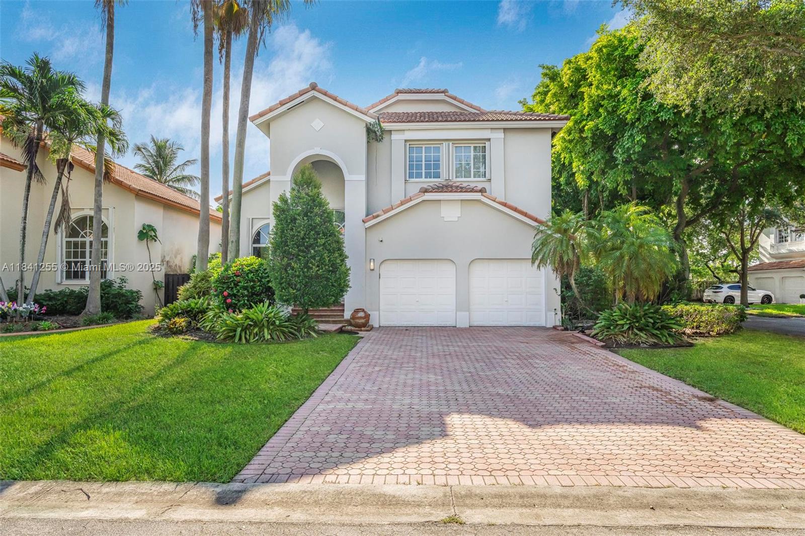 Beautiful single-family home with a private pool located in the exclusive gated community of Doral Isles. This elegant 2-story residence features 4 bedrooms, 3 bathrooms, a 2-car garage, and additional parking in the driveway, with guest parking conveniently located across the property. Spacious layout with plenty of natural light, ideal for family living and entertaining. Enjoy resort-style amenities including lush green areas for walking, scenic lakes, a fully equipped Clubhouse with gym, multiple pools, tennis and basketball courts, soccer field, and an on-site restaurant. Doral Isles offers a vibrant and secure lifestyle in the heart of Doral, just minutes from top-rated schools, shopping centers, restaurants, and hospitals.