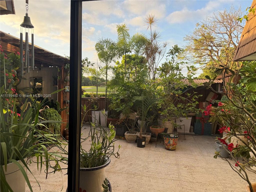 Photo of 9101 SW 19th Pl #C, Davie, FL 33324 (MLS # A11789482)