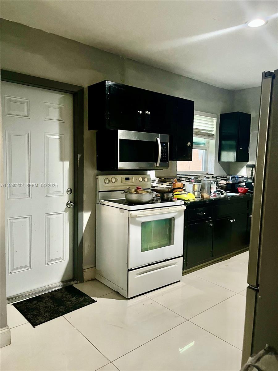 View photos, virtual tours, details... 1643 NW 12th Ct