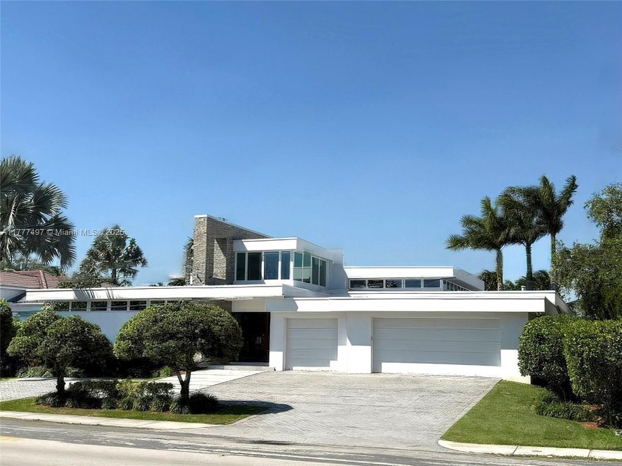 Experience unparalleled luxury in this 2016 ground up constructed architectural gem set on an oversized 15,000 SF lot in the prestigious enclave of Diplomat Parkway - backing to The Shell Bay Golf Club. This custom-built 5-bedroom, 5-bathroom home features soaring 20 and 16 ft ceilings, elegant large format flooring, and a state-of-the-art Kitchen w/ natural gas cooking. Smart home technology, spacious built-out closets, provide convenience and style throughout. Designed for seamless indoor-outdoor living, the property boasts a modern oversized 20 x 40 pool  and covered lounge and dining areas perfect for entertaining. Residence available fully furnished.