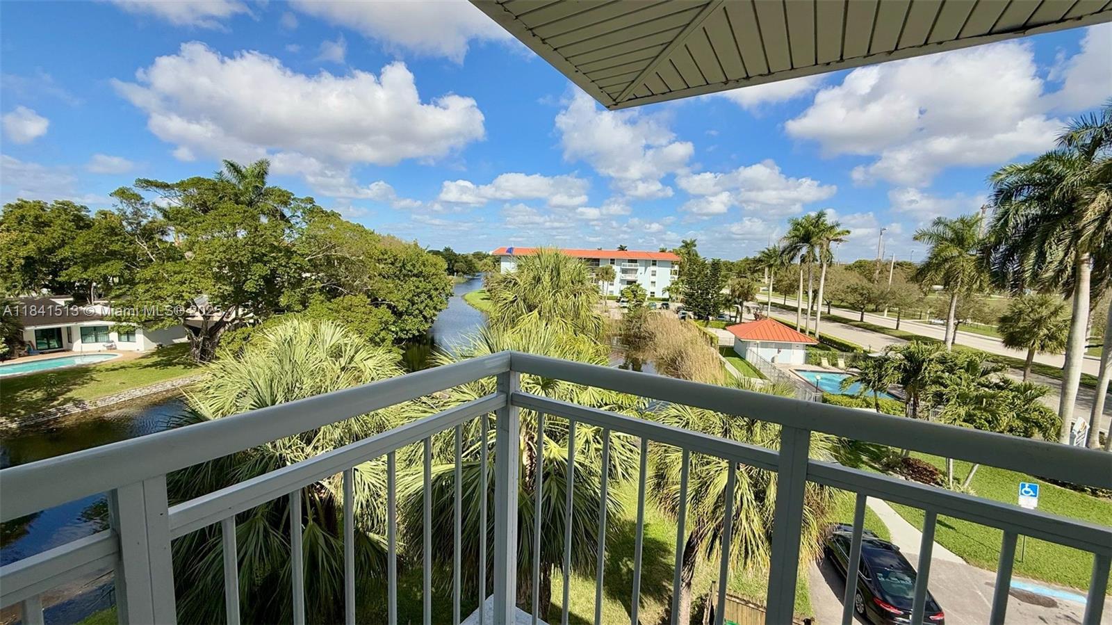 Top floor corner unit with beautiful views. Vacant and move in ready. New wood laminate flooring. Stainless Steel appliances. Impact windows. Elevator. Washer and Dryer on first floor.