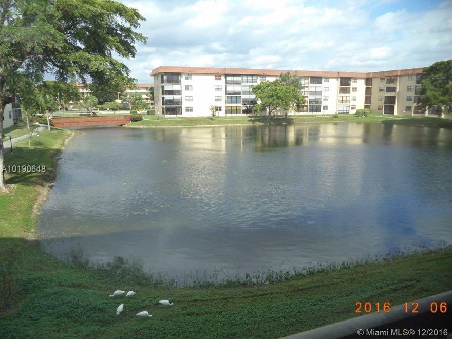 BEAUTIFUL MOVE-IN READY FURNISHED OR UNFURNISHED 2 BEDROOM LAKEFRONT GEM!  FABULOUS VIEW!  FOYER ENTRY LEADS TO LARGE, EAT-IN KITCHEN!  GRANITE COUNTERS!  NEW CABINETS!  NEW APPLIANCES!  OVER & UNDER COUNTER LIGHTING!  SLIDE-OUT SHELVING!  TILED BACK-SPLASH!  HUGE LAUNDRY ROOM WITH EXTRA STORAGE!  BIG MASTER SUITE!  WALK-IN CLOSETS!   BRAND NEW CENTRAL A/C!  ASSOCIATION SAYS 55+.  SHOW & SELL THIS WINNER!