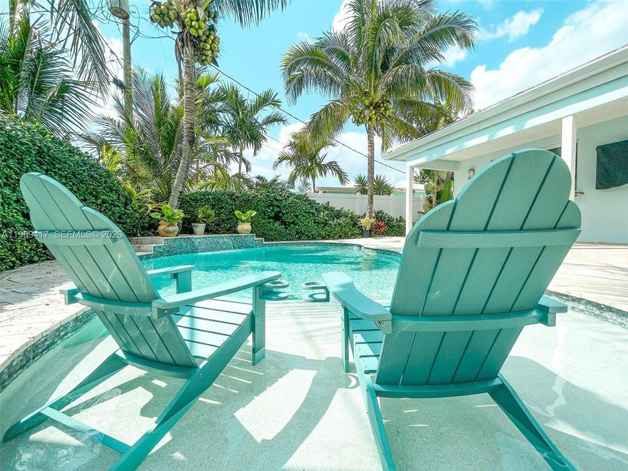 7 MONTH LEASE AVAILABLE MAY 2026 THROUGH DECEMBER 2026 - FURNISHED - Welcome to this charming 3-bedroom, 2-bathroom home located at 2932 NE 36th Street in Lighthouse Point, FL, in the exclusive Lake Placid neighborhood. This property boasts a spacious open floor plan with plenty of natural light. The kitchen features stainless steel appliances and granite countertops. The master bedroom includes an en-suite bathroom. The 2nd full bathroom has a luxurious soaking tub. Enjoy the Florida sunshine in the private backyard with a palm tree lined covered patio and lush landscaping. This home is perfect for entertaining or relaxing with family and friends. Don't miss out on the opportunity to lease this dream home!