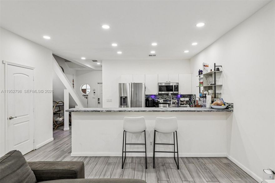 Welcome home to a recently remodeled, furnished 3BR/2.5BA, 1,580 SF townhome in Tuscan View, a boutique 8-unit community in the heart of Hollywood. Enjoy a bright, open layout, a private patio, and a garage converted to storage and a home gym. Recharge in your built-in infrared sauna and enjoy peace of mind with a home security system. An EV charging station makes it ideal for Tesla (or any EV) owners. The primary suite features an ensuite bath, while the two guest bedrooms share a Jack-and-Jill bathroom with direct access from each room. Ideally located near Downtown Hollywood/Young Circle and the beach, with close proximity to Aventura Mall, Hard Rock Casino, Fort Lauderdale–Hollywood International Airport, and just minutes to I-95.